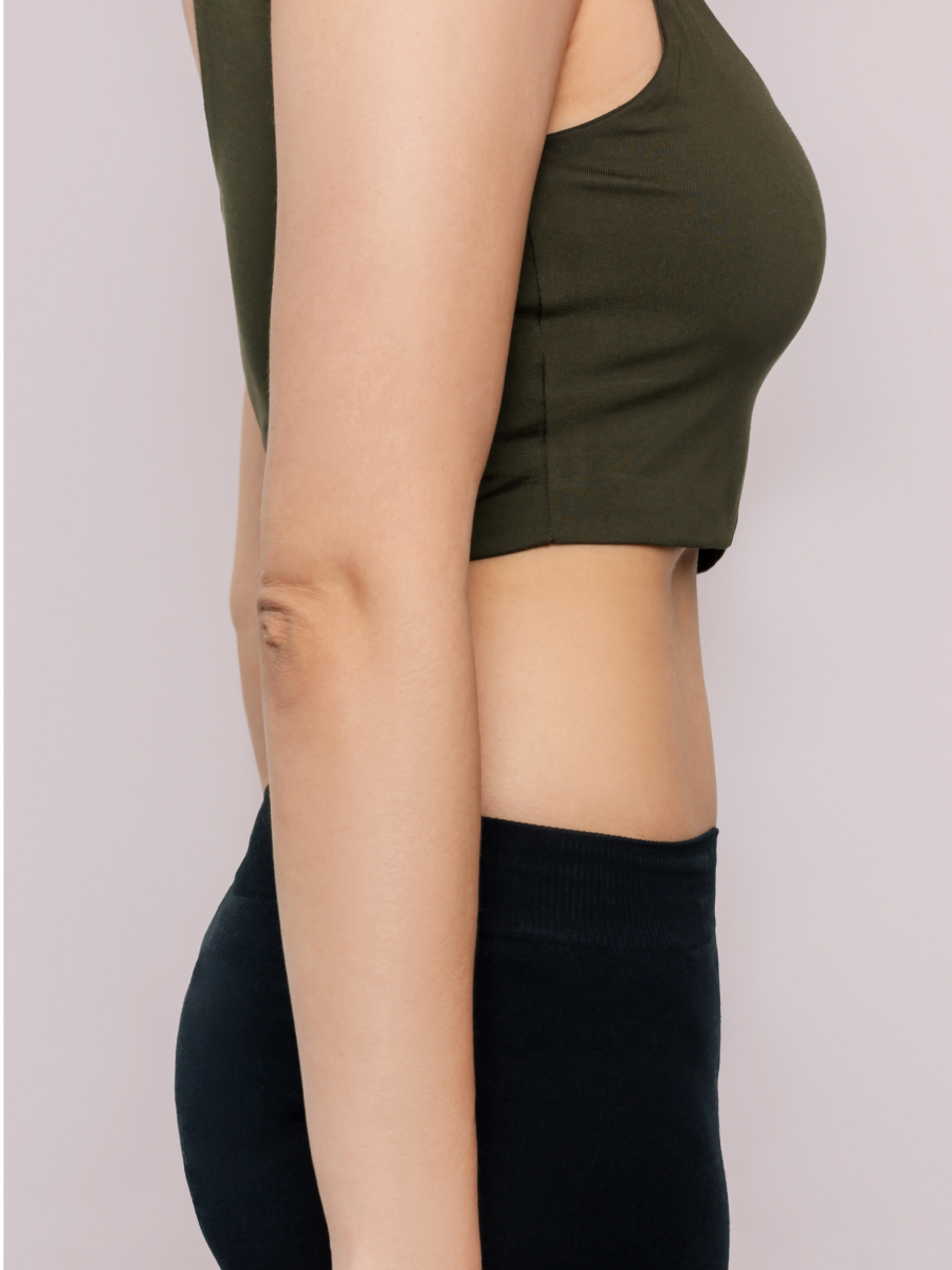 Side view of woman in green top.
