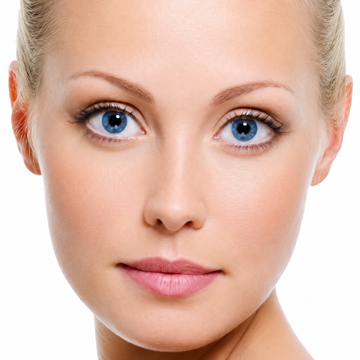 Close-up of woman's face with blue eyes.