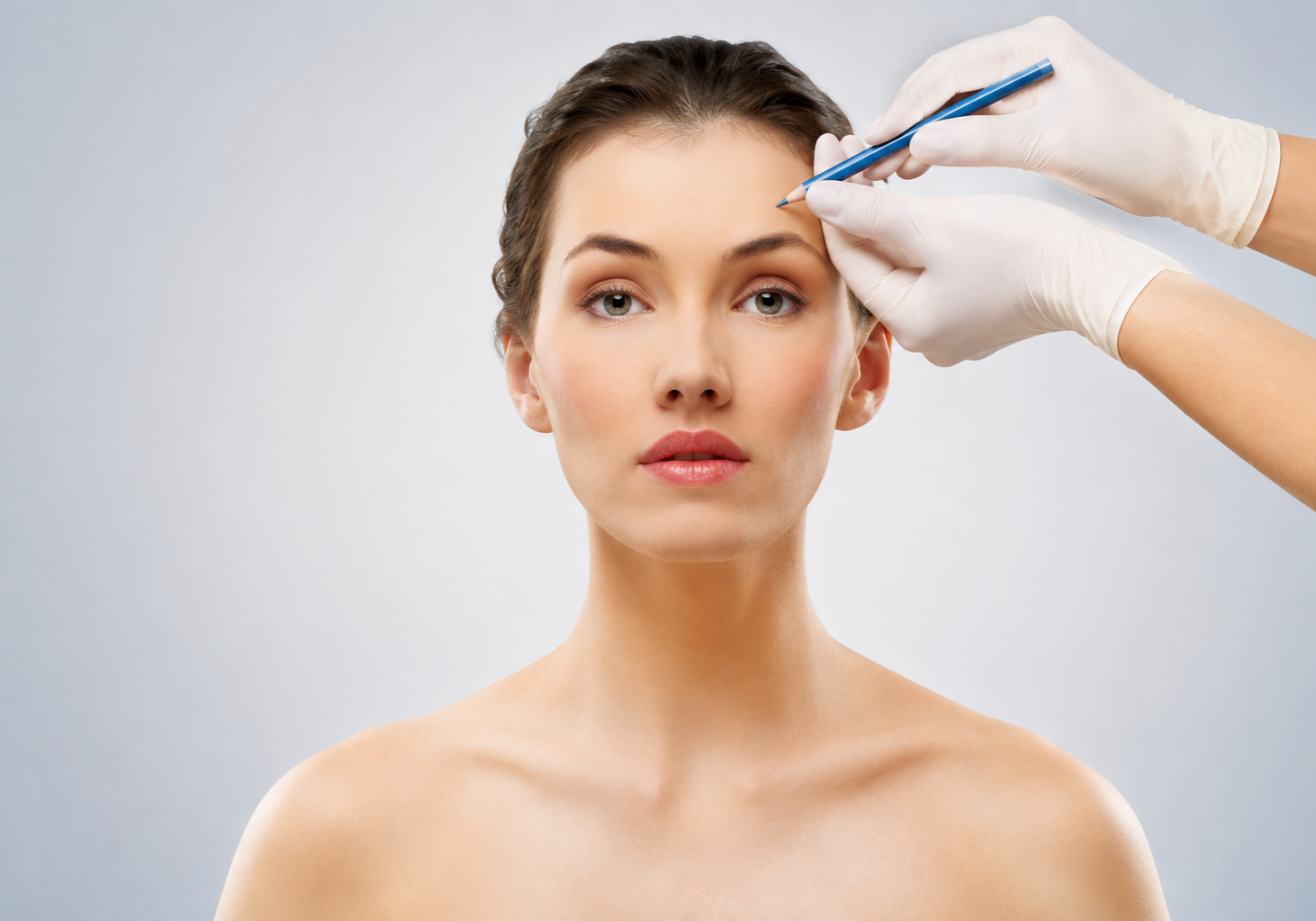 Woman receiving cosmetic forehead procedure.